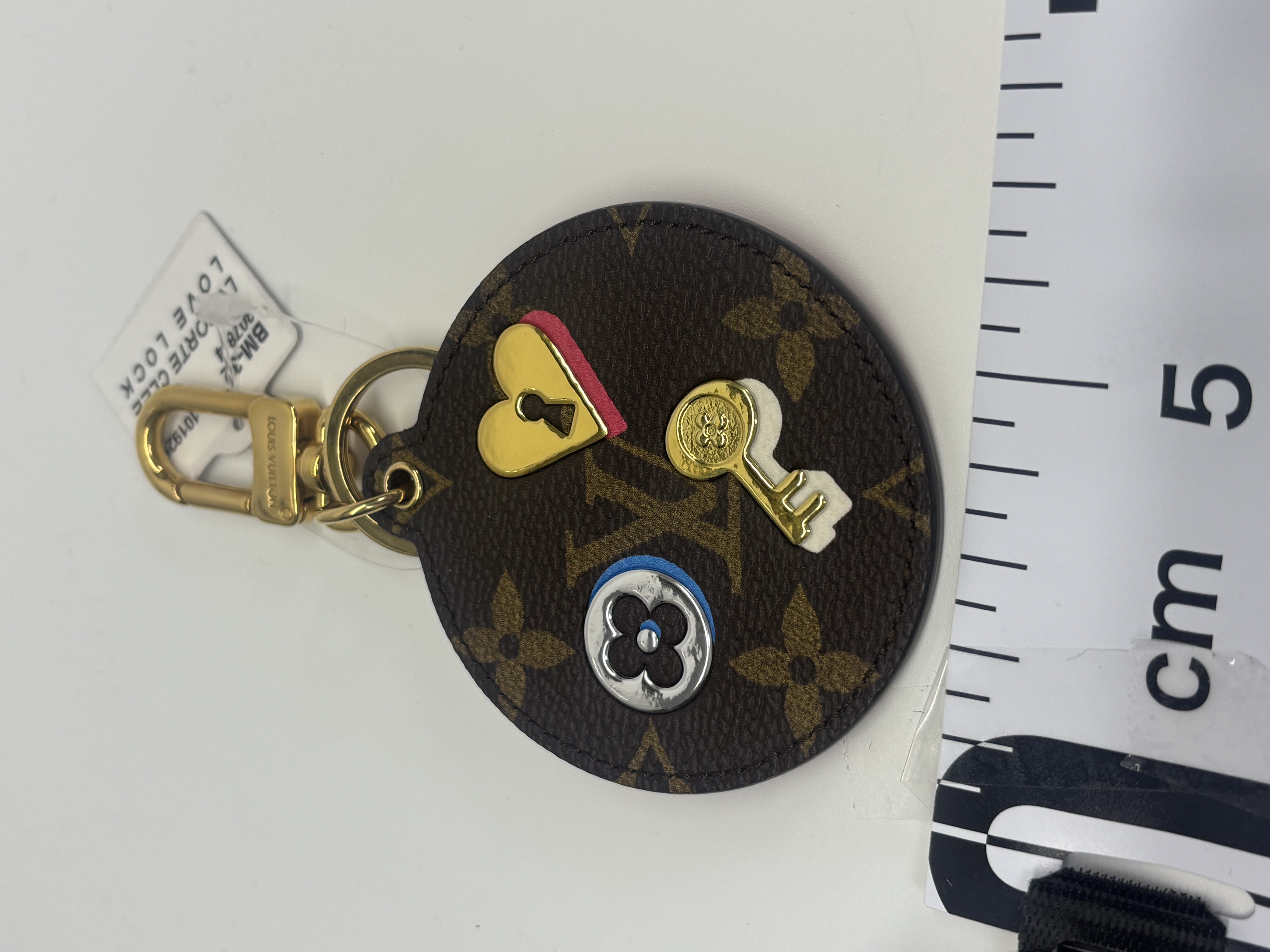 LV PORTE CLEE LOVE LOCK hover
