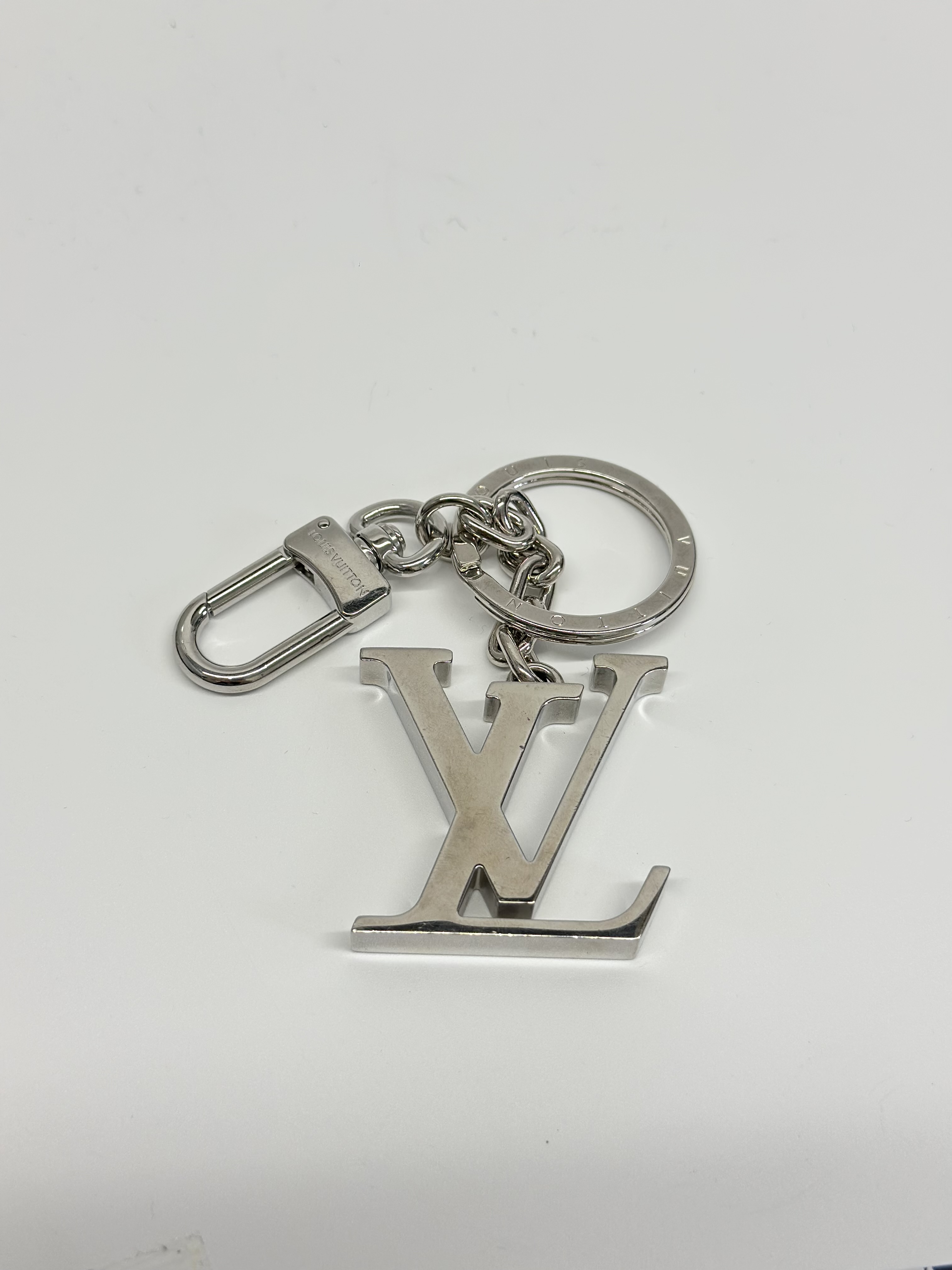 Porte Cles Initiales LV (also referred to as the LV Initials Key Ring)